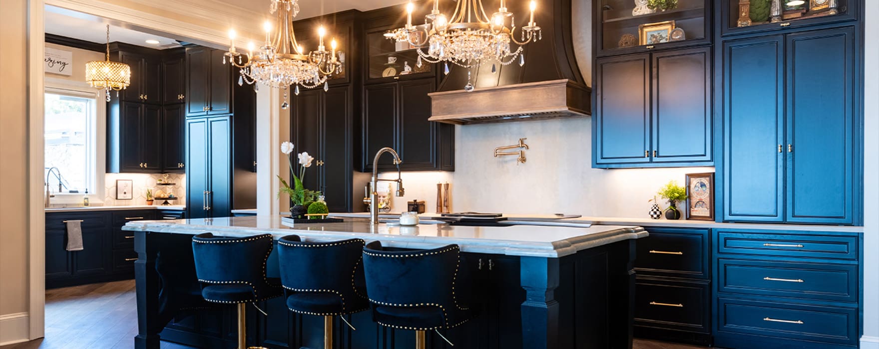 Fred's Cabinet Shop A beautiful kitchen with dark cabinets designed and built by Fred’s Cabinet Shop. Fred's has spent over 50 years perfecting a process that makes creating your custom cabinets simple, stress-free, and enjoyable.