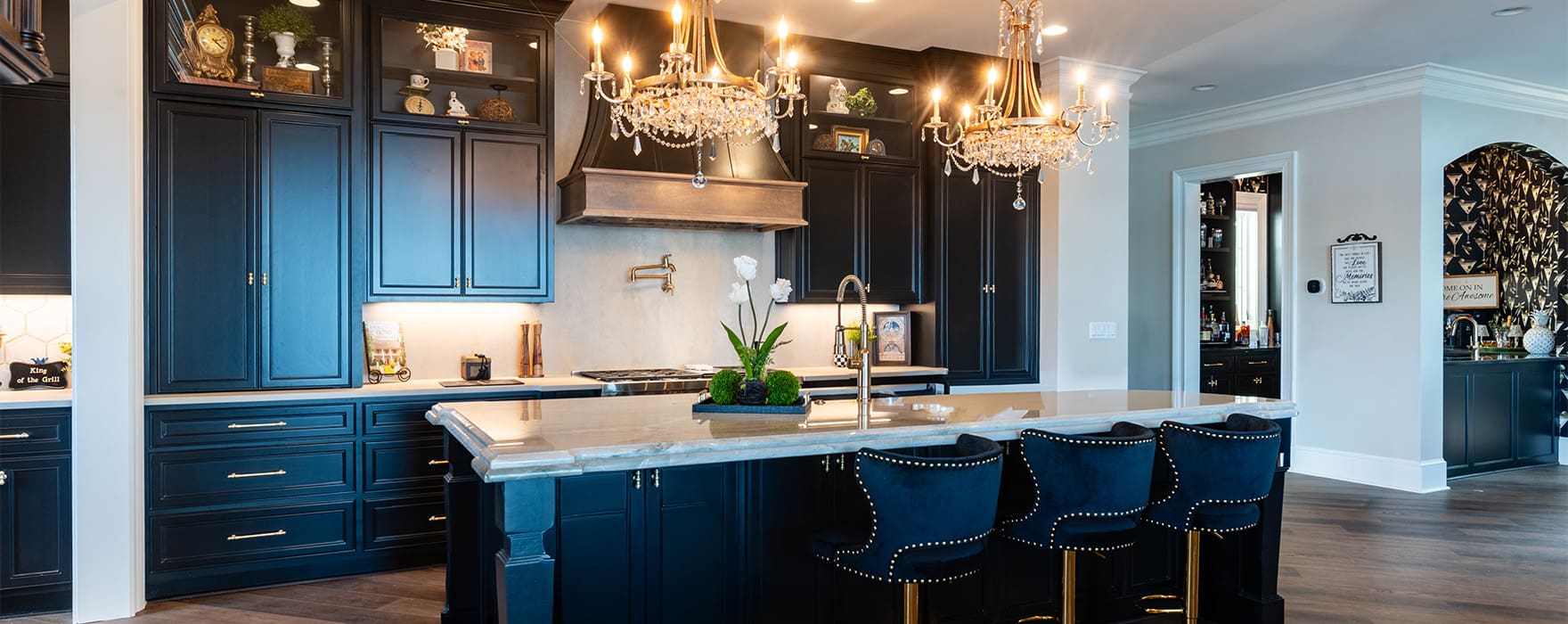 Fred's Cabinet Shop A beautiful kitchen with dark cabinets designed and built by Fred’s Cabinet Shop. Fred's has spent over 50 years perfecting a process that makes creating your custom cabinets simple, stress-free, and enjoyable.